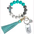 Porte-clés bracelet en perles de silicone turquoise avec pompon en cuir et croix - Ensemble Foi Turquoise