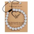White Howlite beaded bracelet with adjustable cord and greeting card gift packaging. - Howlite