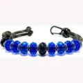 Detail close-up view of handmade beaded sports paracord golf counter keychain ornament. - Style 5