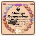 Detailed view of handmade imperial jasper beaded bracelet with adjustable cord and cross charm. - Emperor Stone & Always Remember