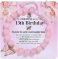 Pink beaded bracelet detail view showcasing butterfly charm and nice birthday greeting card. - 13th