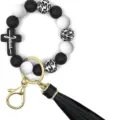 Porte-clés bracelet en perles de silicone noir et blanc avec motif léopard et croix noire. - Jésus Noir