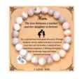 Mother's Day beaded bracelet gift for mom and daughter with stainless steel heart charm. - Pink Zebra Jasper + Mom Card