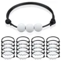 Detailed view of stackable sports bead bracelets featuring golf ball charms on black cords. - 20-Piece Golf Set