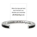 Stainless steel cuff bracelet with engraved inspirational quote and black enamel detail. - Black Steel - Remember