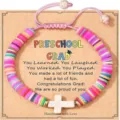 Colorful heishi bead preschool graduation bracelet with white cross pendant and pink cord. - Polymer Clay Cross - 1