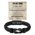 Detailed view of men's black braided leather bracelet with magnetic stainless steel clasp and sentiment card. - 23cm / Love My Son / Electroplated Black