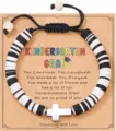 Detailed shot of graduation heishi bead bracelet with cross pendant and congratulatory card. - Polymer Clay Cross - 3