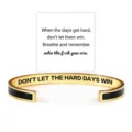 Stainless steel cuff bracelet with motivational engraving, elegant open design for gift. - Black Gold - Don't