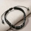 Adjustable black beaded Morse code bracelet with metallic spacers for women daily wear. - Obsidian Braided Bracelet
