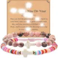 Layered beaded cross bracelet set with pink gemstone and colorful clay disc beads. - 2