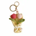 Close-up of handmade crochet tulip bouquet keychain, detailed wool knit charm for bags. - Pink Tulip Pendants