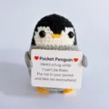 Handmade crochet penguin plush toy detail view, cute mini animal gift with card. - Black