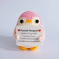 Handmade crochet pocket penguin plush toy detail view, cute mini emotional support gift. - Pink