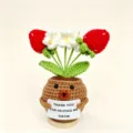 Handmade crochet potted plant with cute animal design and strawberry flowers for gifts. - Puppy Strawberry Potted Plant