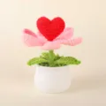 Close-up detail of handmade crochet flower potted plant with red heart, perfect desktop decor. - Positive Potted Plant - Preserved Flower