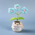 Handcrafted crochet potted plant with smiling face and flowers for desktop decoration. - Style 21