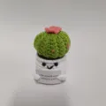 Vista detallada de cactus de ganchillo hecho a mano con maceta linda y tarjeta divertida. - Cactus