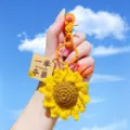 Cute crochet sunflower keychain, yellow yarn flower bag pendant with bell and metal ring. - Sunflower Charm / Yellow