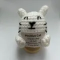 Handmade crochet white cat plush toy with wooden base and positive message card. - Cat
