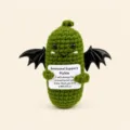 Handmade crochet emotional support pickle doll with bat wings, cute spooky plush toy decor. - Halloween Pickle
