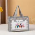 Piccola borsa in TNT con cerniera e stampa colorata di galleggianti, borsa cosmetica portatile. - Boe colorate