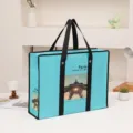 Bolsa de almacenamiento no tejida azul con estampado de la Torre Eiffel y asas negras. - Torre de hierro azul claro * 53*40*16cm