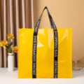 Bolso de compras tejido laminado amarillo grande, bolso tote portátil impermeable. - Amarillo