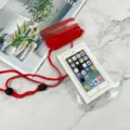 Clear waterproof phone pouch with red lanyard and sealing clip for outdoor water sports. - Red
