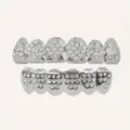 Close-up detail of rhinestone poker teeth grillz with sparkling cubic zirconia. - Silver Set