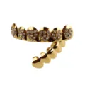Gold hip hop grillz detail showing rhinestone heart pattern upper teeth and smooth gold lower teeth. - Heart Zirconia Inlay / Gold