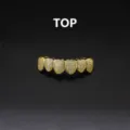 Close-up detail view of iced out gold grillz hip hop teeth grill dental grills jewelry - Gold Top