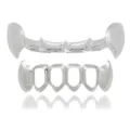 Detailed close-up view of hip-hop silver grillz, glossy cutout vampire fangs teeth set. - Silver Set