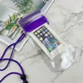 Waterproof phone pouch with purple strap and touch screen design, perfect for beach and diving. - Dark Blue