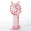 Mini ventilatore portatile rosa con orecchie di coniglio, variante ventilatore USB da tavolo. - Rosa