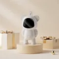 Scaldamani USB portatile bianco dal design astronauta di cartone con display digitale. - Bianco