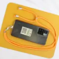 Crossbody phone lanyard orange woven strap with metal buckle and clip for smartphone use - Transparent Insert / Orange