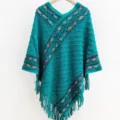 Detailed view of retro ethnic knit poncho, V-neck design and chic fringe hem style. - Diamond Plaid Cloak / Green