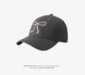 Women's dark grey baseball cap with a cute pink embroidered bow design for sweet casual daily wear. - Dark Gray