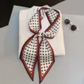 Chic black and white polka dot scarf with red border, versatile long ribbon for neck or hair. - Style 29