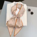 Chic narrow silk scarf with elegant horse print and contrast border, versatile for hair or neck. - Style 3