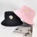 Double-sided bucket hat with small daisy embroidery, stylish sun protection basin hat. - M (56-58cm) / Reversible Pink & Black