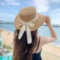 Japanese style straw hat with ribbon bow, frayed edge flat top sunhat for beach vacation women. - One Size / Khaki White