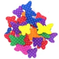 Colorful EVA foam butterfly stickers with polka dots, perfect for kids crafts and DIY decorating. - Small Butterflies with White Dots