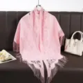 Pink lace triangular scarf detail, hollow floral shawl with fringe, elegant accessory. - Pink