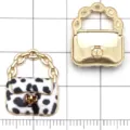 Ciondolo mini borsa in lega di metallo DIY, stampa animalier smaltata e design cavo dorato. - Ciondolo per Borsa con Stampa Mucca