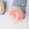 Pink organza flower scarf detail, lightweight sheer chiffon material, elegant accessory. - Style 1