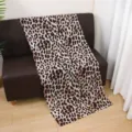 Detail view of the elegant leopard print satin polyester long scarf and versatile women shawl. - 15#