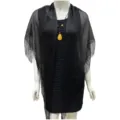 Detailed view of the black metallic fringe shawl, showcasing hollow knit and elegant tassels. - Black with Black Silk