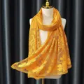 Elegant yellow lace hijab scarf for women, floral pattern fashion headwrap shawl main view. - Yellow